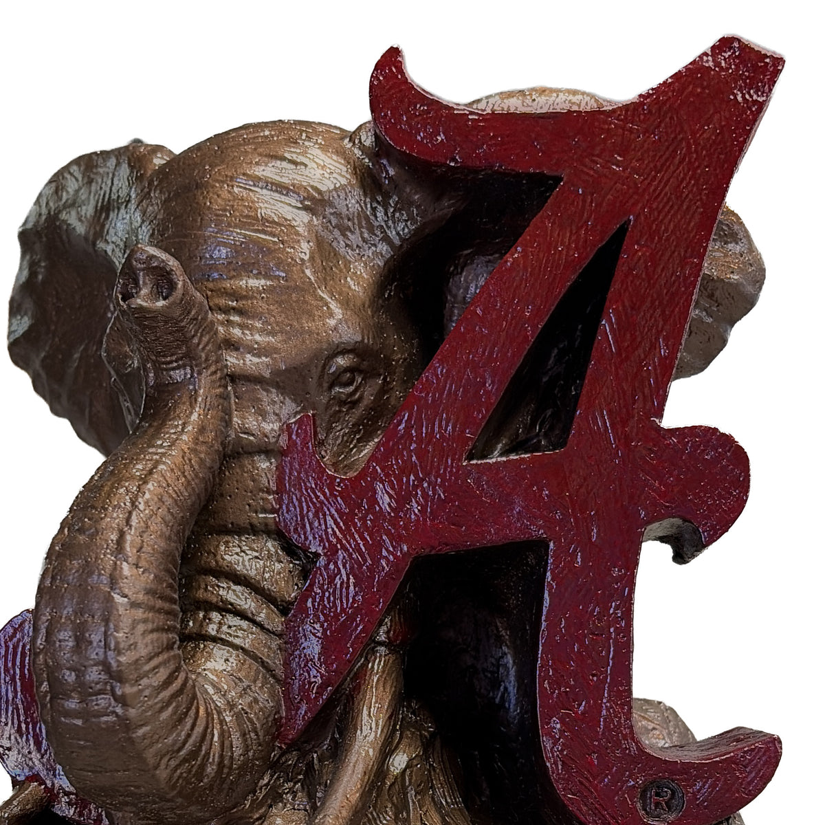 Close-up of the crimson script A on the Alabama Crimson Tide elephant and script A desk sculpture