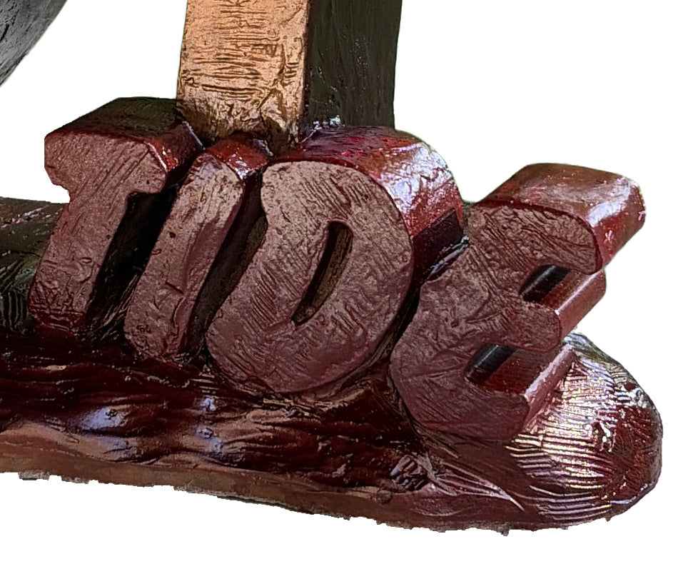 Close-up of the crimson TIDE letters and glossy wave base on the Alabama Script A porch statue